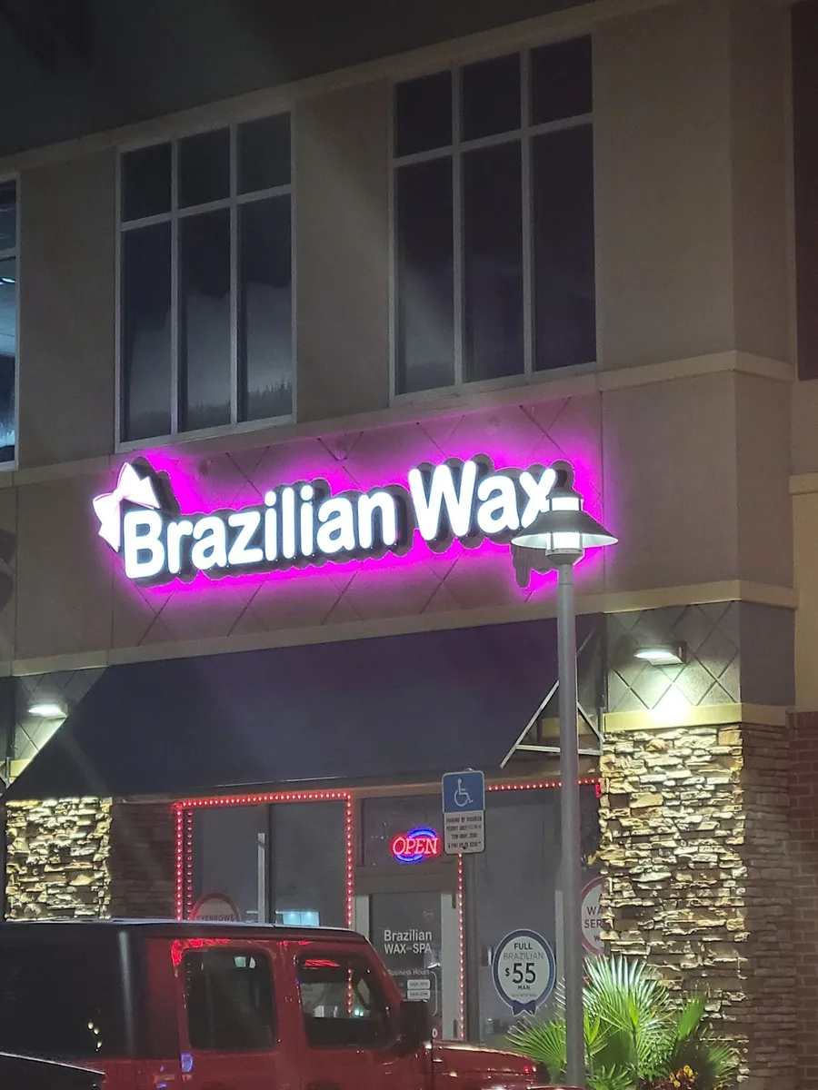 Illuminated exterior sign at the Tampa spa